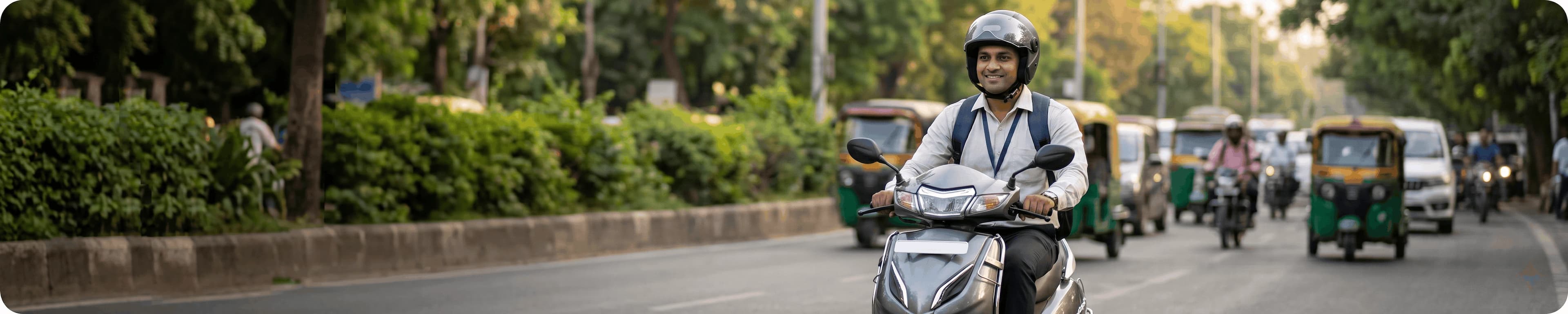 Commuter riding a monthly rental scooter in Mount Abu